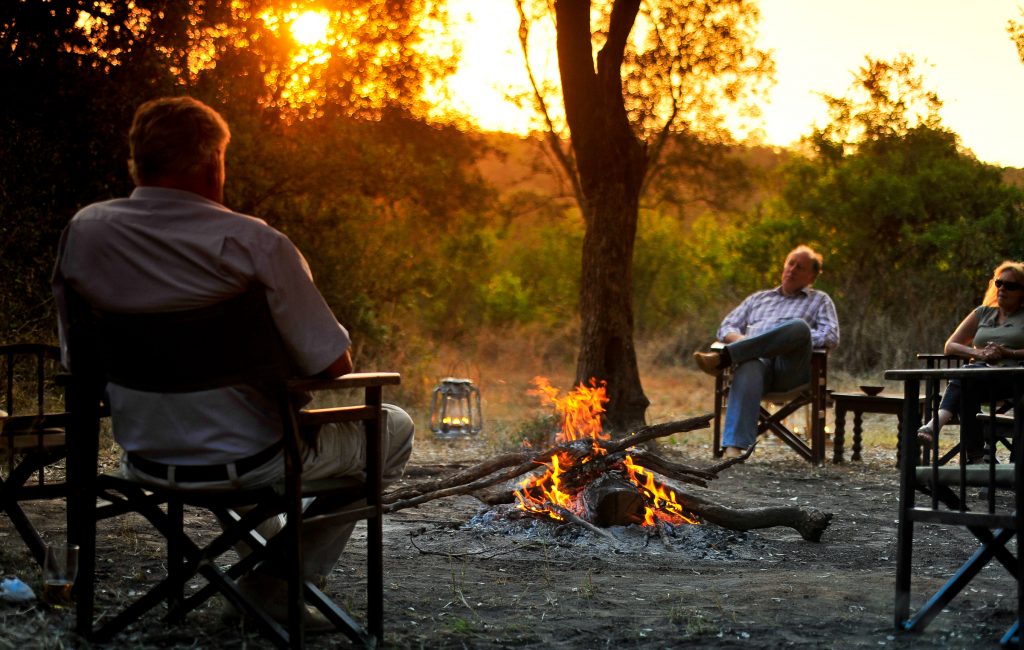 By the fire, Nairobi Tented Camp, Kenya